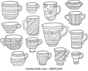 Set of hand drawn cups with cute ornaments. Doodle style. Vector