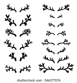 Set of hand drawn deer horns black on the white background, silhouette of antlers