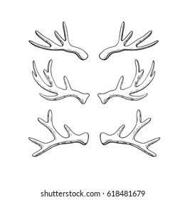 Set of hand drawn deer horns isolated on white. Vector illustration in rustic style.