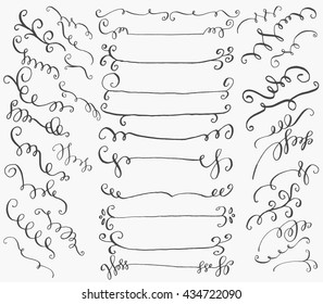 Set of hand drawn dividers, swirls and ornaments. Isolated design elements