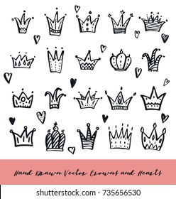 Set of hand drawn doodle crowns. Brush painted simple textured symbols. Cute and stylish design elements collection.