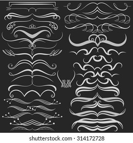 Set of hand drawn doodle design elements on chalkboard. Decorative swirls, scrolls, dividers. Vintage Vector Illustration.