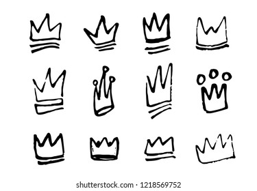 Set of hand drawn doodles crowns. Vector illustration EPS 10