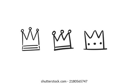 Set of hand drawn doodles crowns. Vector illustrations. Queen and King symbols.
