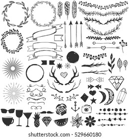 Set of hand drawn elements for decoration and design. Arrows, borders, feathers, wreaths, leaves, branches.  Vintage sketch collection.