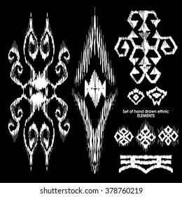 Set of hand drawn ethnic, tribe elements. Geometric orient pattern details on black background. Ornamental textile elements for rug, carpet, cover or blanket in indian style.