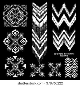 Set of hand drawn ethnic, tribe elements. Geometric orient pattern details on black background. Ornamental textile elements for rug, carpet, cover or blanket in indian style.