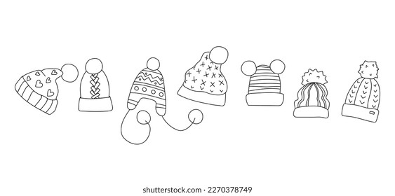 Set with hand drawn hats with pompons. Vector illustration in doodle style. Isolate on a white background.