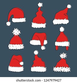 Set of hand drawn hats of Santa Claus. Vector illustration.