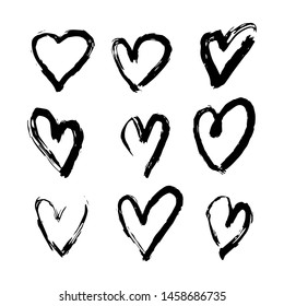 Set of hand drawn heart. Black ink shapes. Freehand hearts isolated on white background. Vector illustration