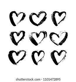 A set of hand drawn hearts brush strokes. Black Ink hearts for t-shirt, dress, cloths. Sketchy Valentine's Day background. Vector illustration EPS 10 file.
