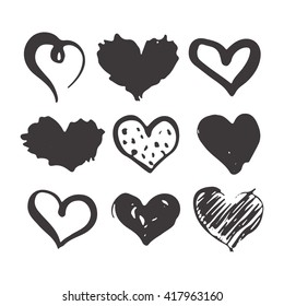 Set of hand drawn hearts isolated on the white background. Monochrome brush ink illustration with hearts. 