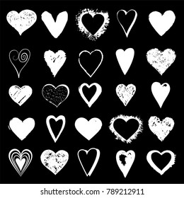 Set hand drawn hearts isolated on black background. Vector Illustration