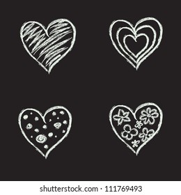 Set of hand drawn hearts on chalkboard background. Vector illustration.