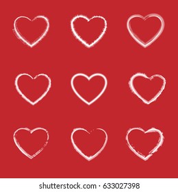 Set of hand drawn hearts on red background. Vector illustration.