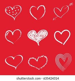 Set of hand drawn hearts on red background. Vector illustration.