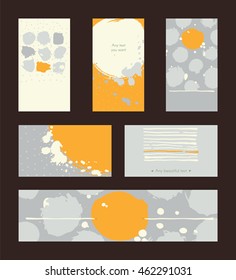 Set of hand drawn horizontal and vertical business cards decorated with liquid ink brush splashes, stripes, strokes and spots. Isolated on background vector illustration in grey and yellow