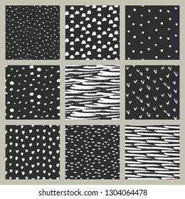 Set of hand drawn ink seamless patterns. Endless vector backgrounds of simple primitive scratchy textures with dots, stripes, hearts.