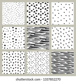Set of hand drawn ink seamless patterns. Endless vector backgrounds of simple primitive scratchy textures with dots, stripes, hearts.