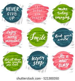 Set of hand drawn lettering badges with inspirational quotes and splashes