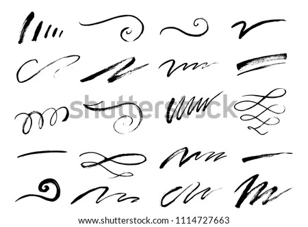 Set of hand drawn lettering and calligraphy swirls, squiggles. Vector ink decorations for composition