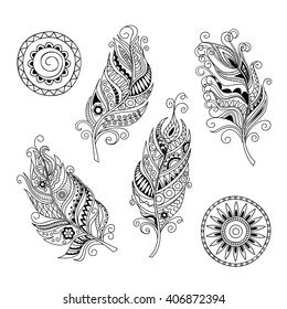 Set of hand drawn  mandalas and feathers isolated on white in boho. Image for adult and children coloring books, pages, tattoo, decorate dishes, cups, porcelains, shirts, dresses, bags, tunics. EPS 8.