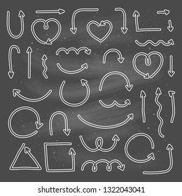 Set of hand drawn outline marker arrows isolated on the blackboard.