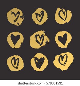 Set of Hand drawn paint heart. Black and gold romantic card. Abstract brush drawing. Grunge Vector art illustration