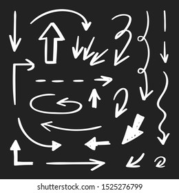 Set of hand drawn paint object. Abstract doodle arrows, pencil drawing stripes for design use. White elements on black background
