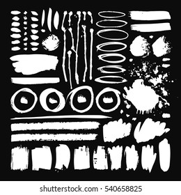 Set of hand drawn paint object for design use. Acid colors on black background. Abstract brush drawing. Vector art illustration grunge splashes, drops, stains, frames, blot