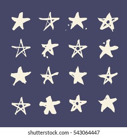 Set of hand drawn paint object for design use. White on dark blue background. Abstract brush drawing. Vector art illustration grunge stars