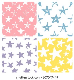 Set of hand drawn paint seamless pattern. Violet, pink, yellow, blue and white stars background. Abstract brush drawing. Grunge Vector art illustration