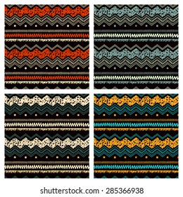 Set of Hand drawn painted ethnic seamless patterns. Tribal  traditional pattern of American indians. Use for wallpaper, pattern fills, web page background, fabric. Zigzag and stripe line.