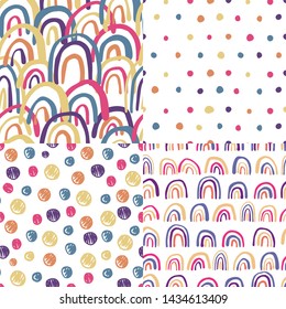 Set of hand drawn rainbows seamless pattern. Polka dot wallpaper. Vector background. Simple design for fabric, textile print, wrapping.