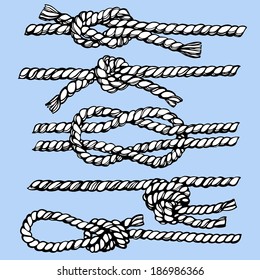 Set of hand drawn ropes and knots. Vector isolated illustration in sketch style 