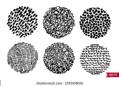 Set of hand drawn scribble spots in circle shapes isolated on white. Doodle style sketches. Monochrome vector design elements. Drawn texture rounds set.