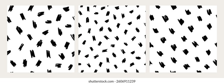 Set of hand drawn seamless black and white abstract patterns with brush strokes, shapes, and dashes. Modern minimalistic textures, perfect for fabrics, wallpapers, packaging, graphic design projects