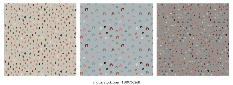 Set of hand drawn seamless patterns. Endless abstract vector backgrounds of simple primitive textures with colorful dots.