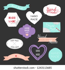 Set of hand drawn shapes in different colour with lettering "Handmade". Hearts, banners, circles and ribbons etc. Hand drawn vector various design elements for labels, tags or stamps and badges.