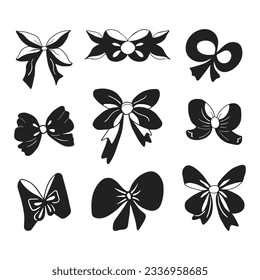 Set of hand drawn silhouette of bows and ribbons. Bows and ribbons icons in solid style. Isolated on white background