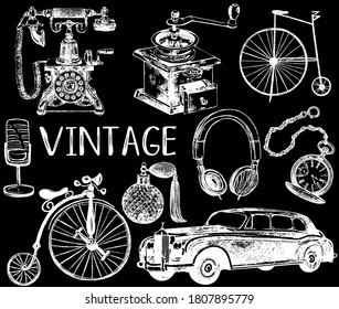 Set of hand drawn sketch style different vintage objects isolated on black background. Vector illustration.