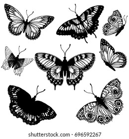 Set of hand drawn sketch style butterflies. Vector illustration isolated on white background.