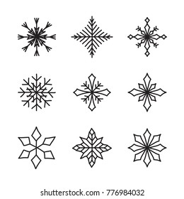 Set of hand drawn snowflakes. Delicate snow icon silhouettes. Vector illustration with editable strokes. Isolated on white background. Design elements for christmas, seasonal greetings, or any use.