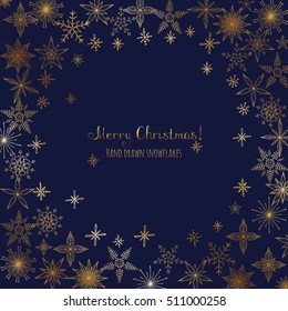 Set of hand drawn snowflakes. Ornament made from decorative golden snowflakes. Vector sketch illustration Christmas blue background with glitter snowflakes. Merry Christmas concept. Happy new year.