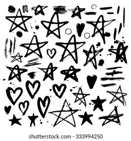  Set of hand drawn stars and hearts. Grungy elements. Brush strokes and splatter. Vector illustration.