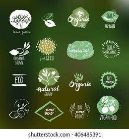 Set of hand drawn style stickers and badges for organic food and drink, natural products, restaurant, healthy food market and production, on the nature background. Vector illustrations.