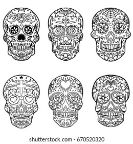 Set of hand drawn sugar skulls. Day of the Dead. Dia de los Muertos. Vector illustration