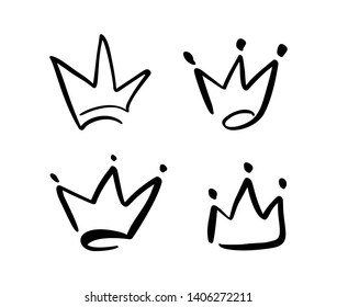 Set of hand drawn symbol of a stylized crown. Drawn with a black ink and brush. Vector illustration isolated on white. Logo design. Grunge brush stroke
