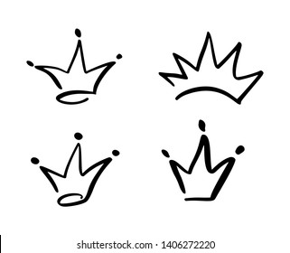 Set of hand drawn symbol of a stylized crown. Drawn with a black ink and brush. Vector illustration isolated on white. Logo design. Grunge brush stroke