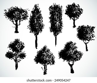 Set of hand drawn trees. Ink spots. Isolated on white.